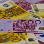 A close-up image of Euro banknotes used for business finance in Estonia.